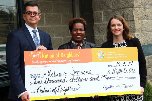 Photo of David Decker, Tracy Rawls, and Amy Jones with big check