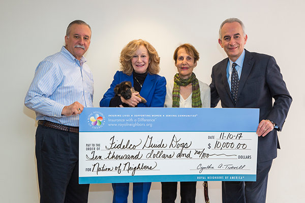 Photo of Pete Tedone, Fidelco director; Cynthia Tidwell, Royal Neighbors president and CEO; Lillian Johnson, Fidelco client and board member; and Eliot Russman, president of Fidelco