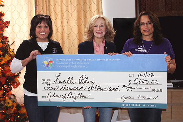 Photo of Tracy Kotecki, Cynthia Tidwell, and Lucy Blasi holding big check Photo of Tracy Kotecki, Cynthia Tidwell, and Lucy Blasi holding big check