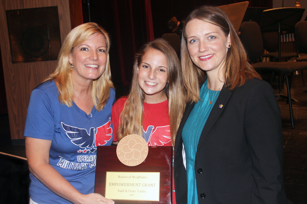 Photo of Kadi Tubbs, Graci Tubbs, and Amy Jones with award