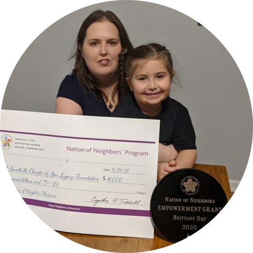 Nation of Neighbor recipient Brittany Day with her daughter