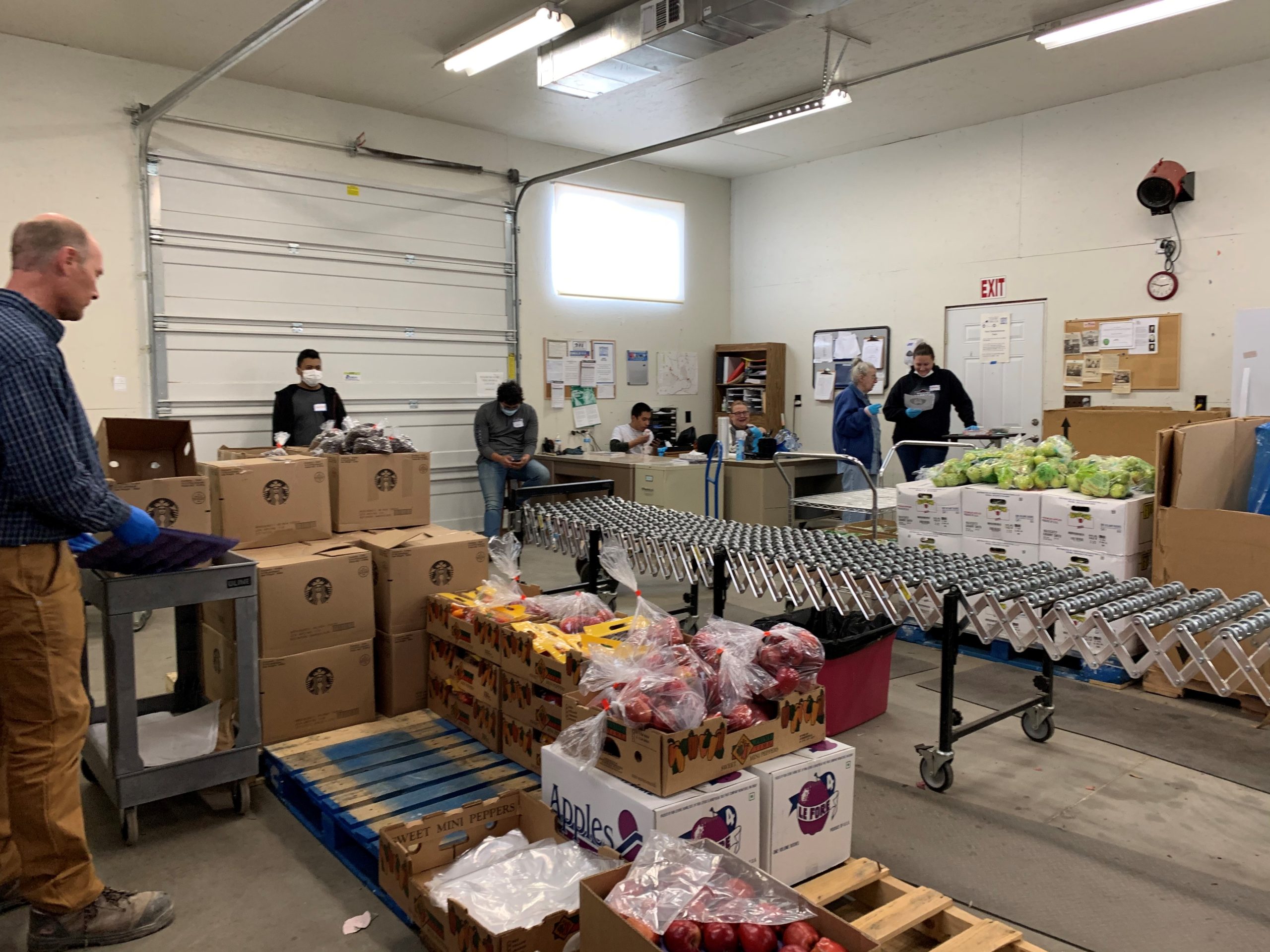 Chapter Members working at a food pantry