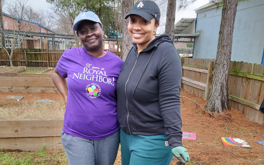 Royal Neighbors members growing food in their community.